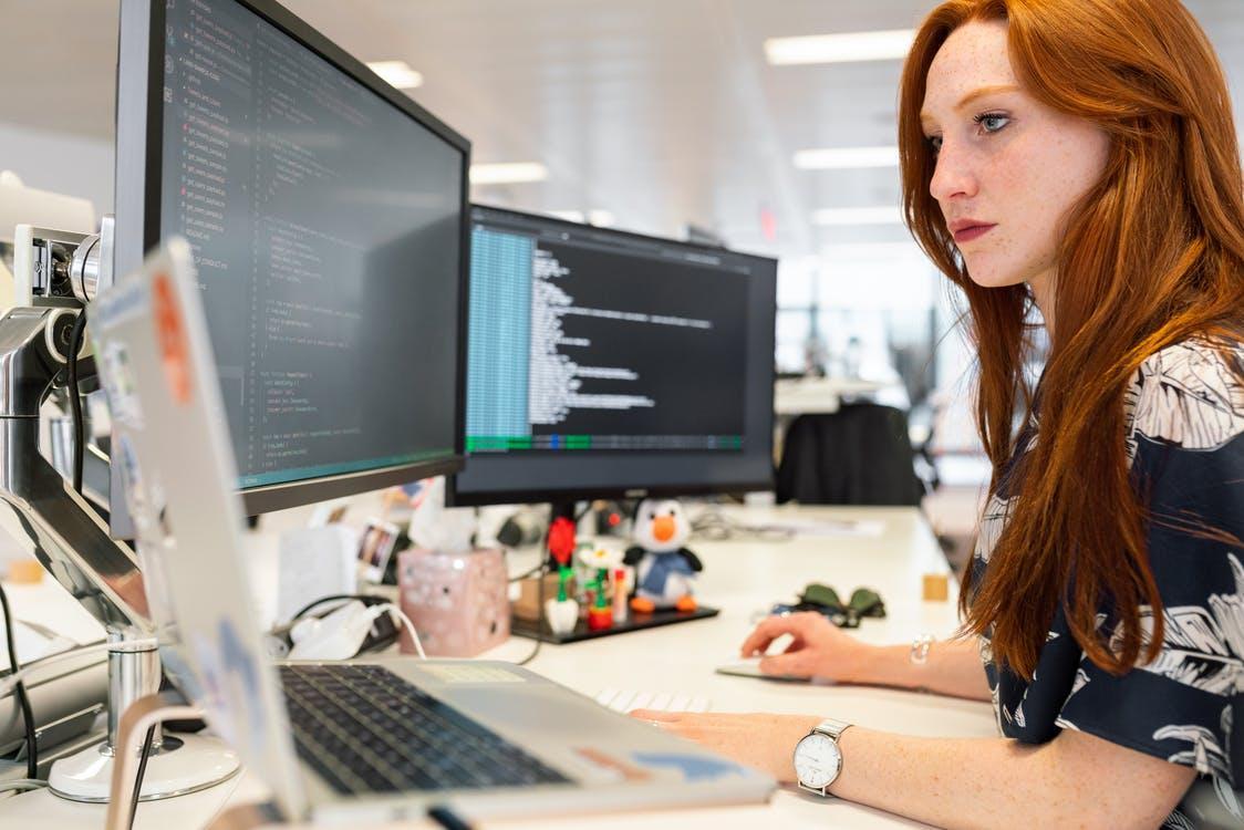 Free Woman Coding on Computer Stock Photo